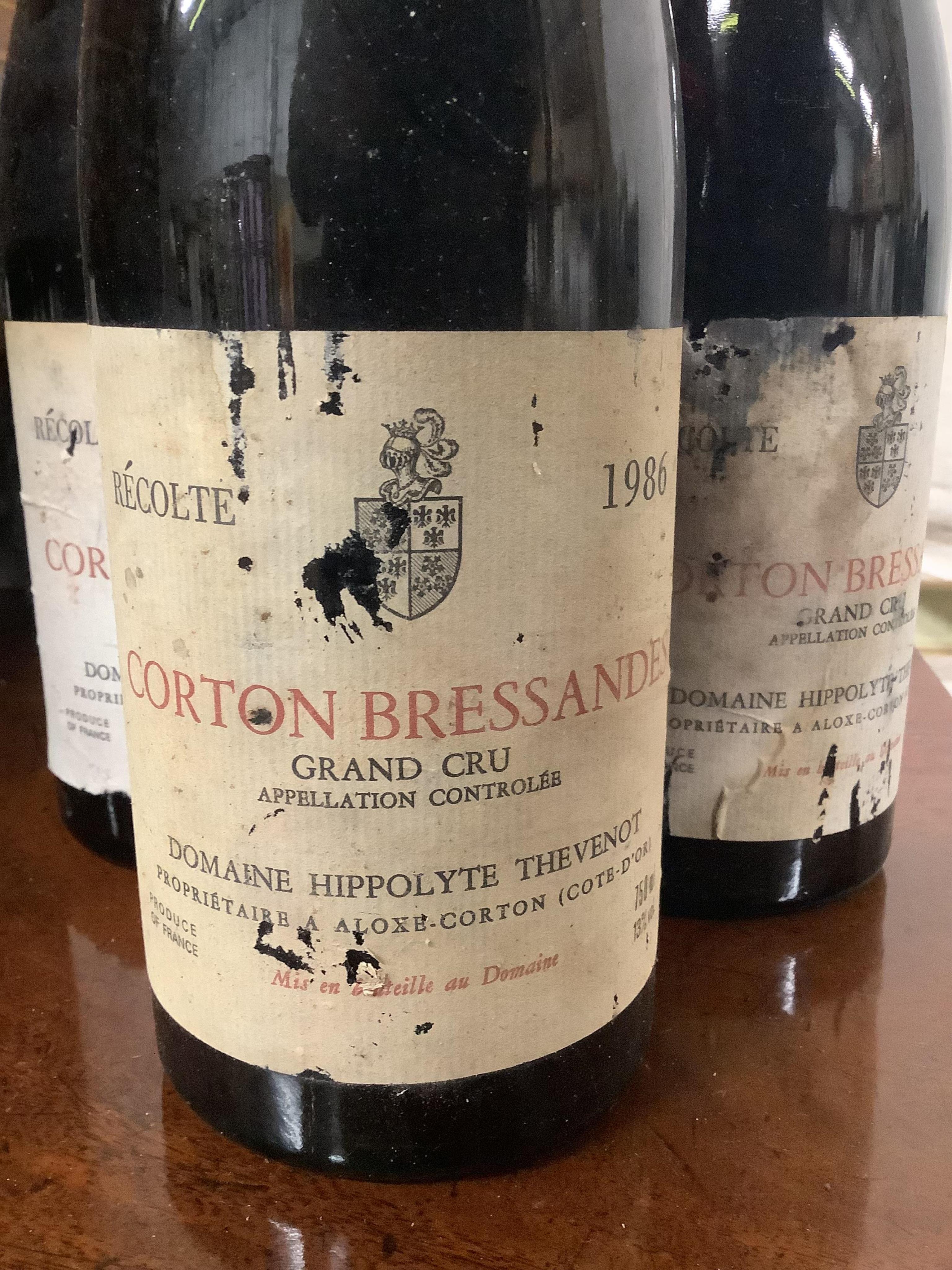 Nine bottles of Domaine Hippolyte Thevenot Corton Bressandes, Recolte Grand Cru 1986. Condition - fair, from a local private cellar